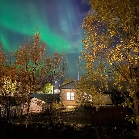 House In The Lights And Aurora Nyaraló